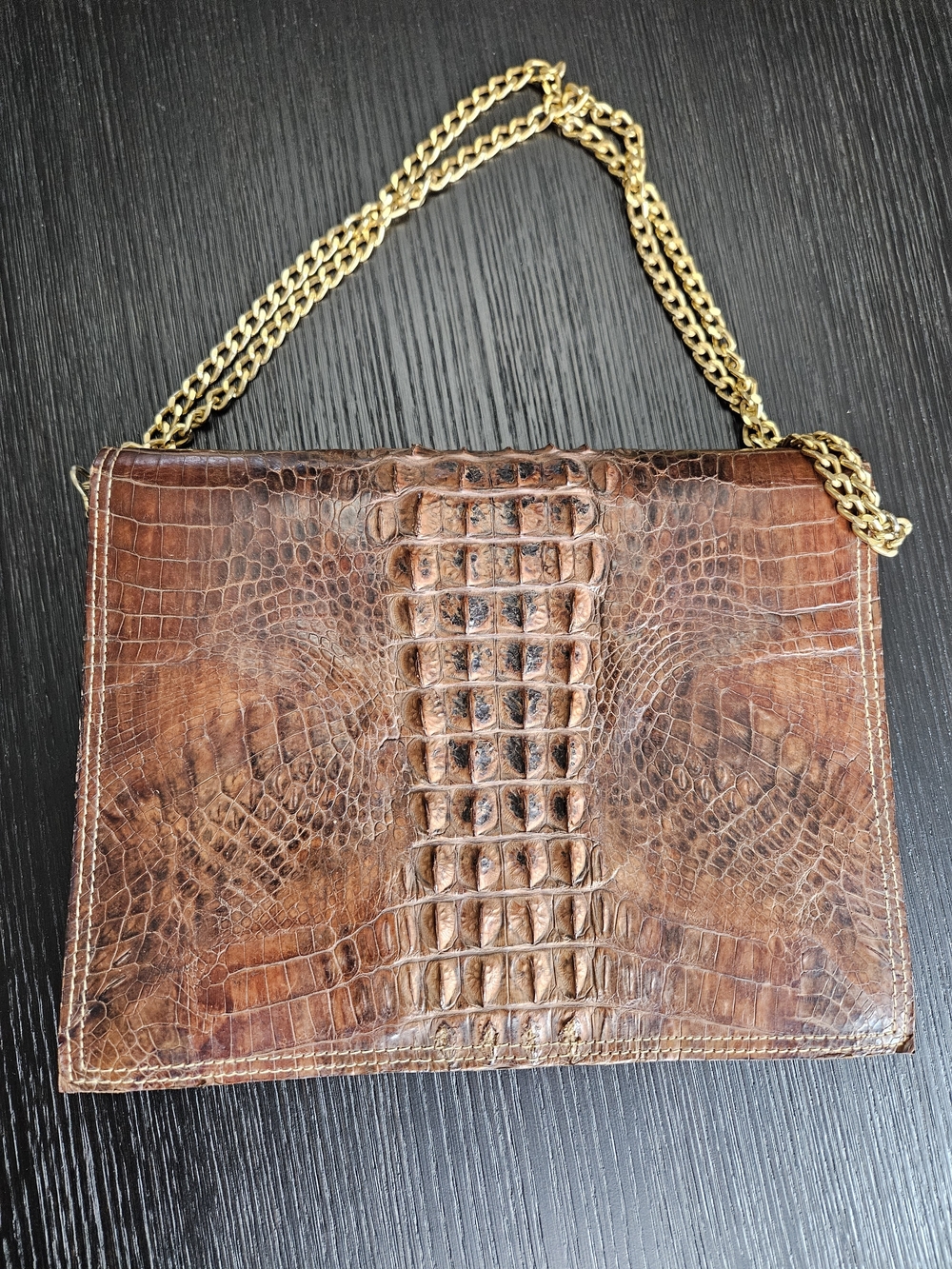 Brown vintage shoulder bag with a crocodile-effect texture